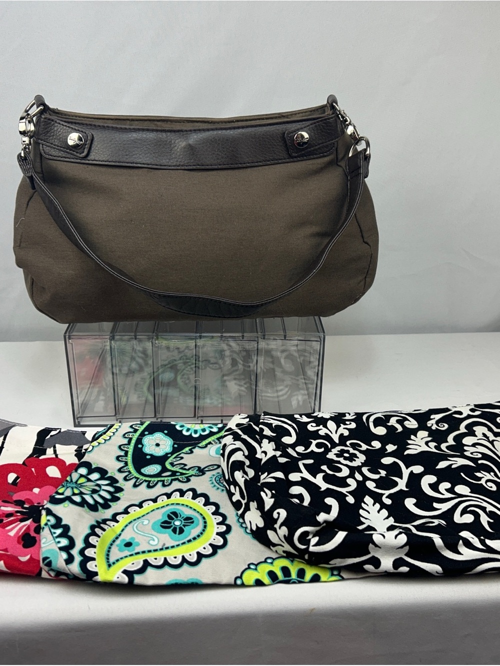 thirty-one brown Canvas Shoulder Bag with Dark Brown Trim and (3) skirts